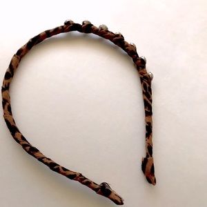 Anthropologie leopard with seven rhinestone studs